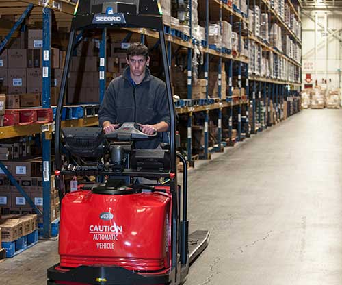 Raymond Courier Automatic Forklift in Warehouse operation